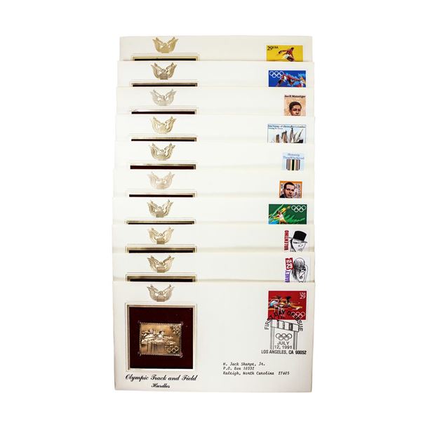 Lot of (10) First Day Of Issue 22KT Gold Replica Stamps in Envelopes