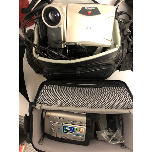 Group of 2 handycam digital cameras w/ bags - Samsung & Sharp