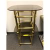 Image 1 : Two brass tables smoked glass from the show..