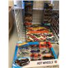 Image 2 : Hot Wheels hardcover coffee table book with Hot Wheels 10 multi pack and two 5 packs