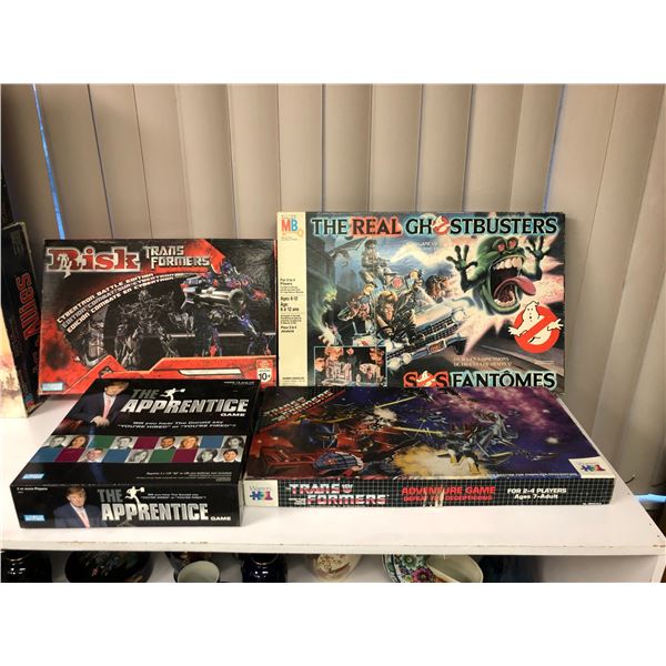 Group of 4 games/ toys - 2 Transformers/ The Apprentice/ The Real Ghostbusters 3D Game