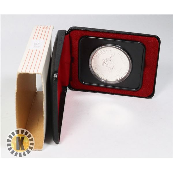 1975 CANADIAN SILVER DOLLAR IN DISPLAY