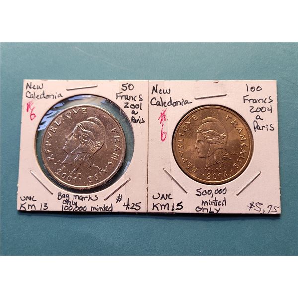 14)  LOT OF 2 NEW CALADONIA COINS:  2001 50 FRANCS