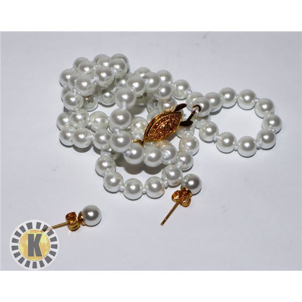 13)  SET OF WHITE 6MM SOUTH SEAS PEARL 18"