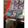 Image 8 : BINDER OF POKEMON CARDS AND BOX OF DVDS AND VIDEOGAMES