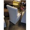 Image 8 : 4 MONTANA WHITE LEATHER ROLLING DINING CHAIRS