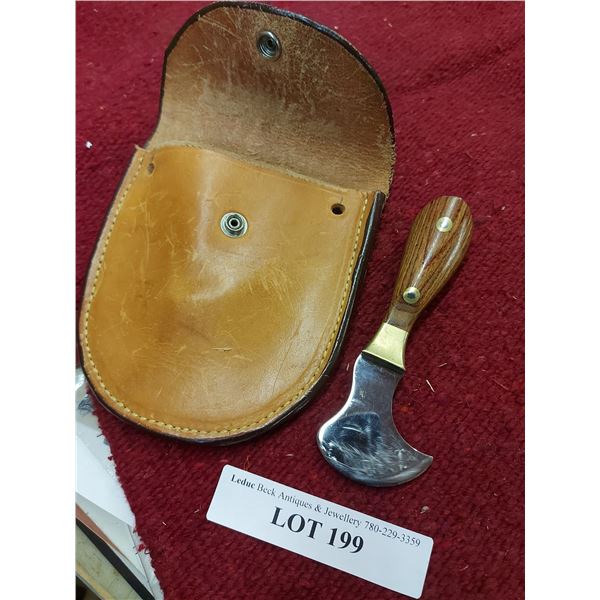 Round knife and leather case