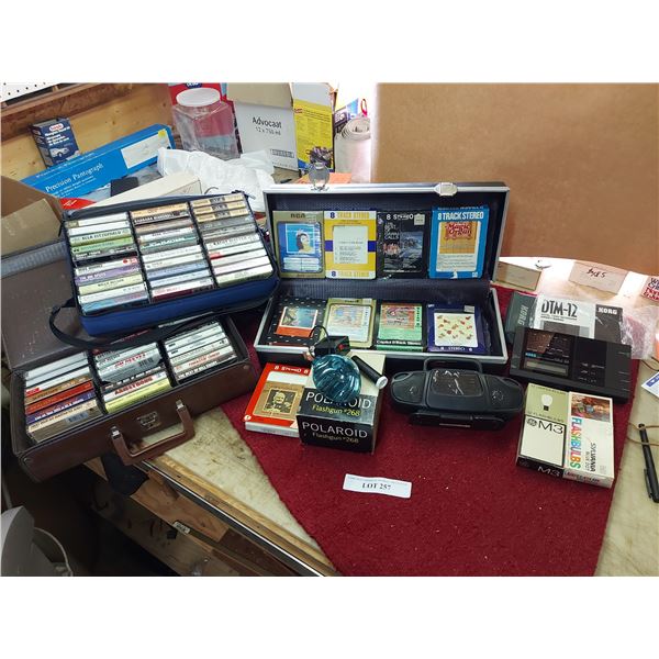 Asst 8-track and cassette tapes, Polaroid flash gun #268, Suntone portable radio, Korg Drg. Tuner Me