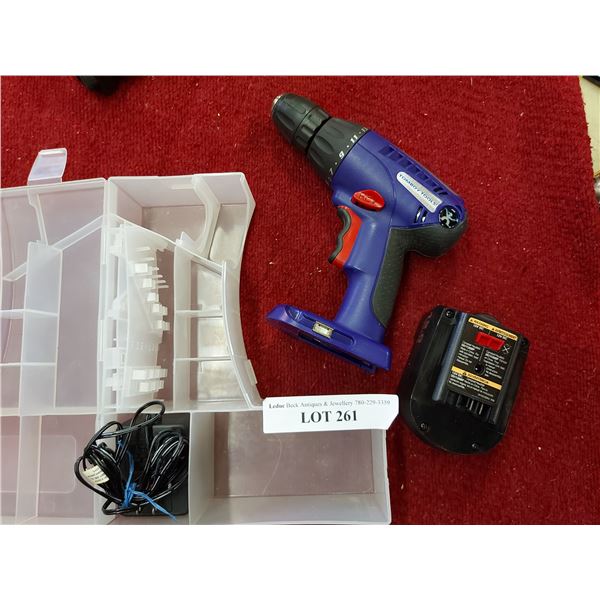 Tomboy Tools drill with plastic case and charger