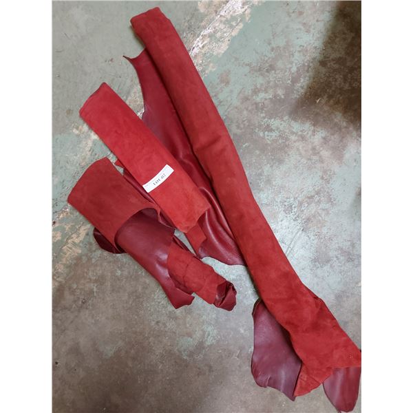 Asst rolls of red designer whole hides