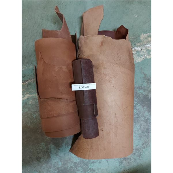 Asst rolls of red latigo side cowhide