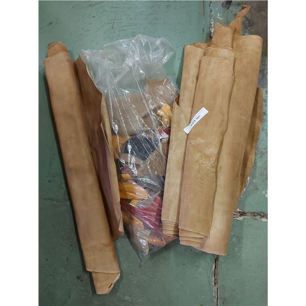 Roll of tan suede and other scrap leather pcs