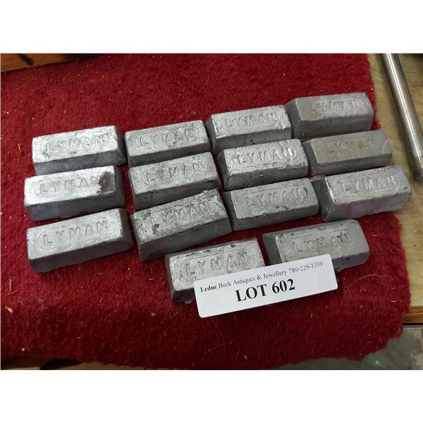 Set of 14 Lyman lead ingots - asst weights