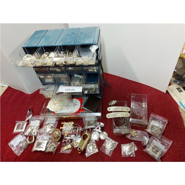 Plastic storage drawer unit, asst engraves buckles, snaps, zipper pulls, finishing pieces, calculato