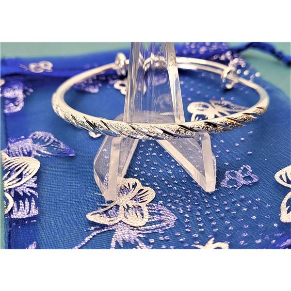 11)  SILVER TONE ETCHED ADJUSTABLE BANGLE