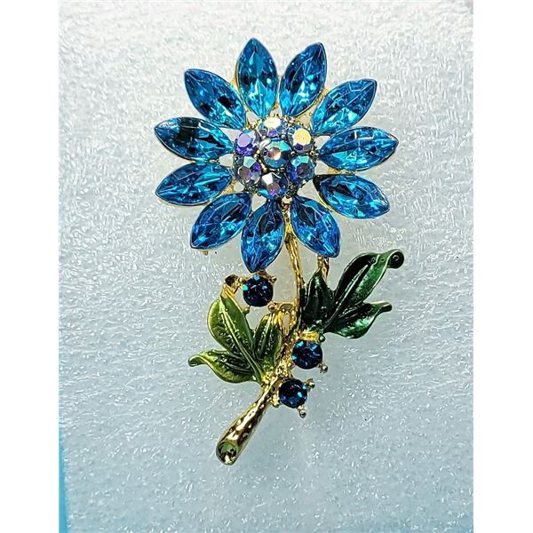 9)  RHINSTONE AND ENAMEL FLOWER BROOCH