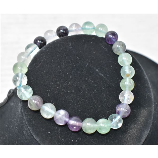 #338-NATURAL FLUORITE BEAD BRACELET 7.5"