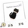 Image 1 : NEW VINTAGE LOOK BLACK CAT BROOCH. CAT HAS GREEN