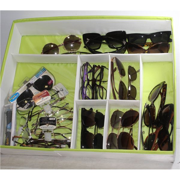 FLAT OF READING AND SUNGLASSES ALL TOGETHER
