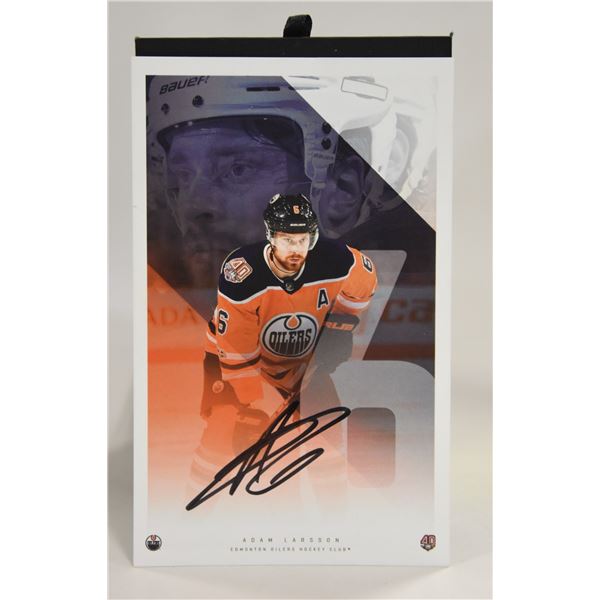 ADAM LARSSEN AUTOGRAPHED CARD.