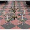 Image 1 : BRASS AND CRYSTAL CHANDELIER.
