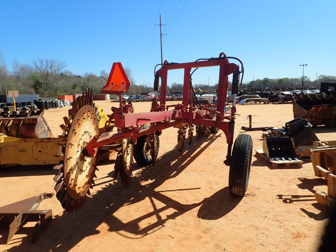 HARRELL ROOT RAKE, 7 RAKE WHEELS - J.M. Wood Auction Company, Inc.