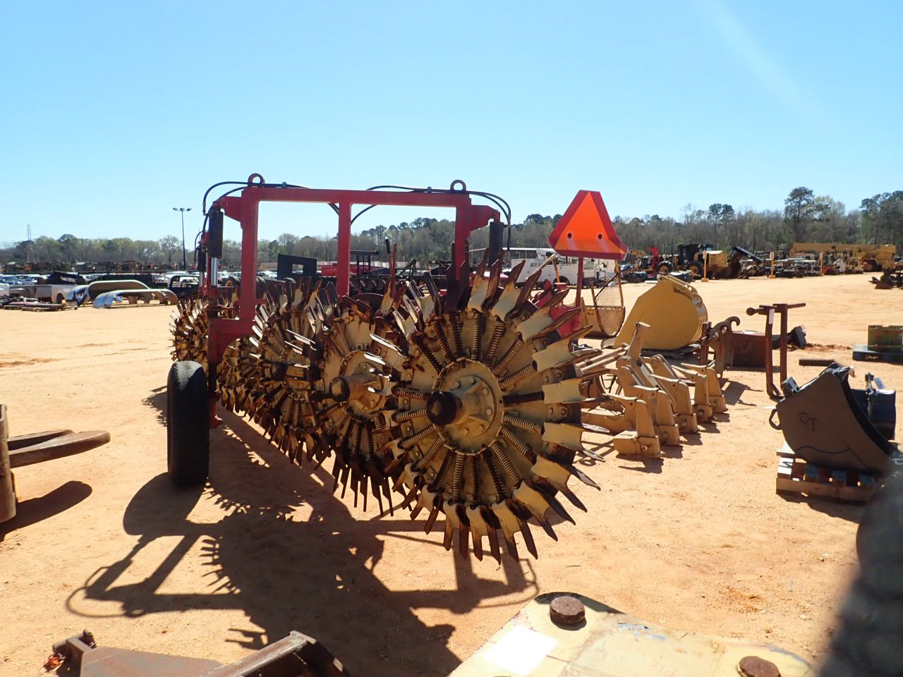 HARRELL ROOT RAKE, 7 RAKE WHEELS - J.M. Wood Auction Company, Inc.