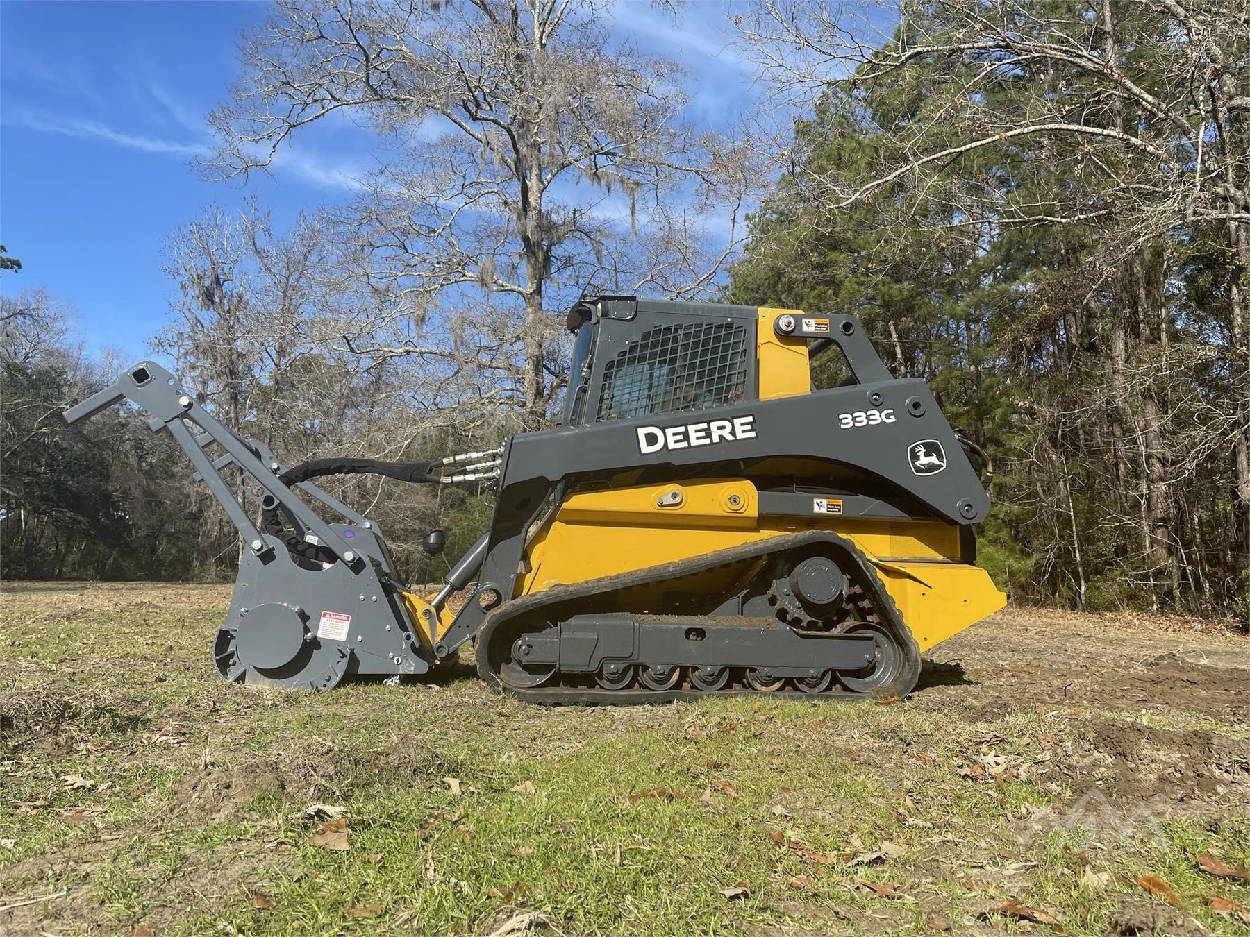 2017 JOHN DEERE 333G Skid Steer Loader Mulcher J.M. Wood Auction Company, Inc.