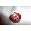Image 1 : 14 Karat Gold Charm Encasing an Enamel Orchid #2308307