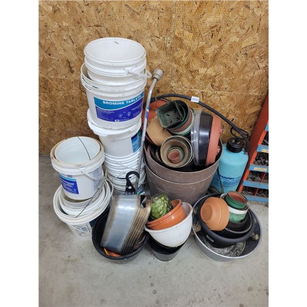 Various Sizes of Buckets and Potters