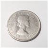 Image 1 : Silver Canadian 50Cent Coin  (~length inches), Suggested Retail Value $100