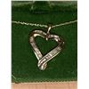 Image 1 : Heart Shaped Diamond .40 carat round/baquette cut Pendant and chain set with appraisal $1,900.00