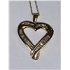 Image 2 : Heart Shaped Diamond .40 carat round/baquette cut Pendant and chain set with appraisal $1,900.00
