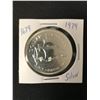 Image 1 : 1979  CANADIAN SILVER DOLLAR {MADE OF SILVER NOT NICKEL}