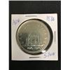 Image 1 : 1976  CANADIAN SILVER DOLLAR {MADE OF SILVER NOT NICKEL}