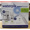 Image 1 : NEW WATERPIK WATERFLOSSER DUO INCLUDES