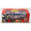 Image 1 : #575 BOXED 1:24 SCALE DIE CAST RACING CHAMPIONS