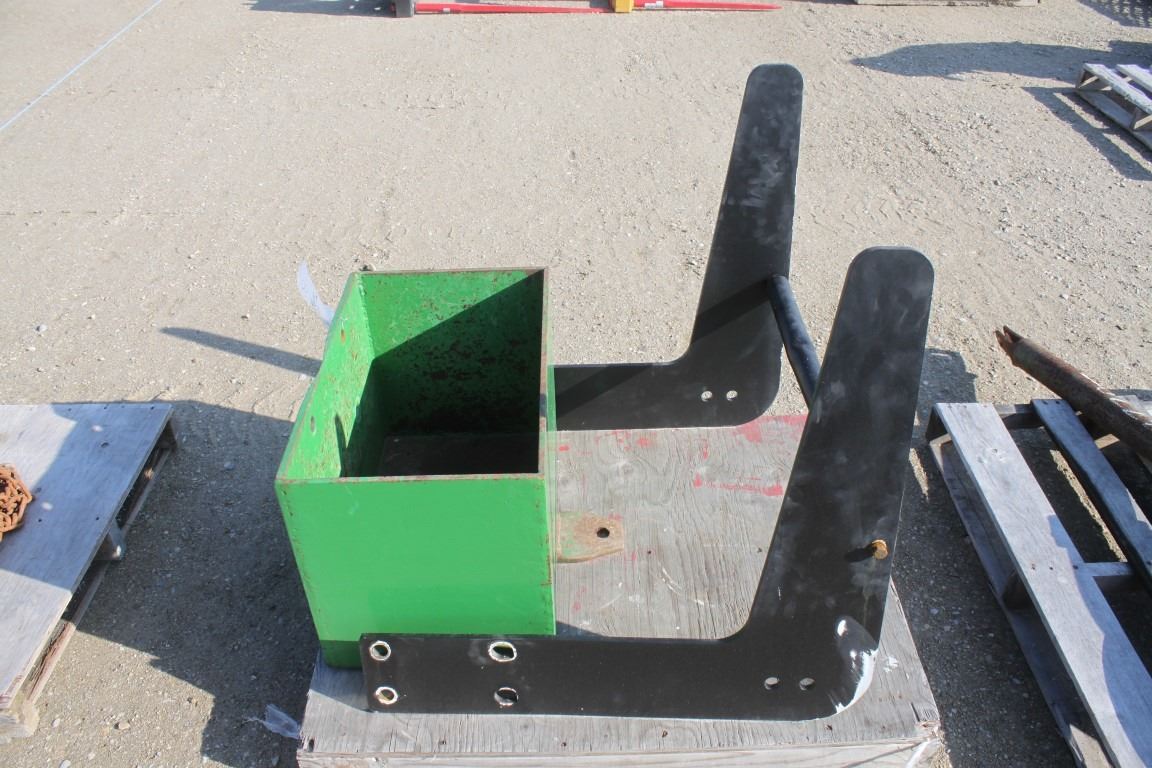 Homemade tractor front mount stone box and tractor front grill guard