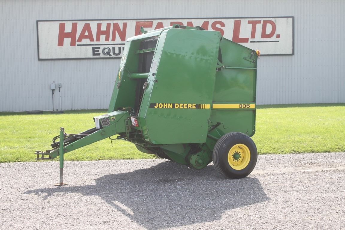 JD 335 4x4 round baler, ramp, hydraulic tie, double twine arm