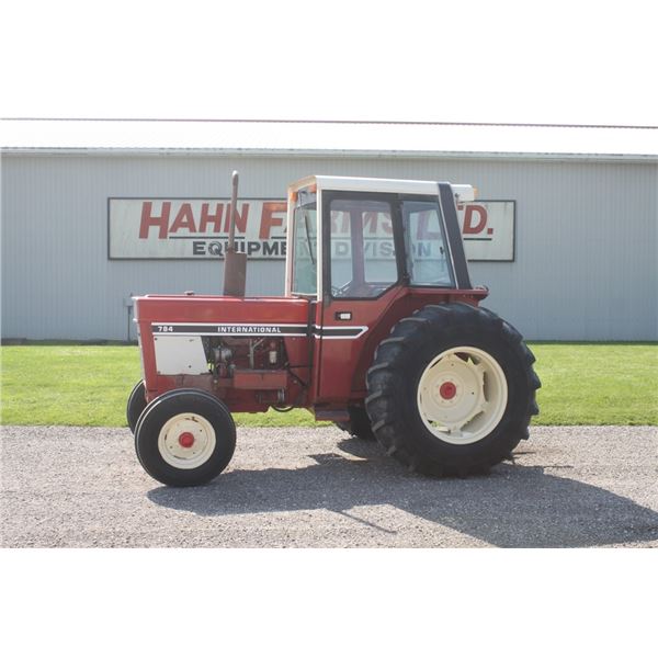 IH 784 2wd tractor, cab, 3pth, 18.4x30, 1299 hours showing, 1 remote, one owner