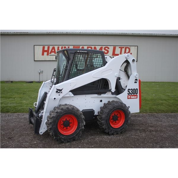 Bobcat S 300 skidsteer, cab, air, 2 Speed, hydraulic coupler, axuilary hydraulics, 6,000 hours