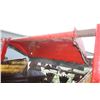Image 9 : New Holland 680 tandem axle manure spreader, top beater, end gate