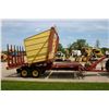 Image 3 : New Holland Stackliner 1038 automatic bale wagon, tier turner, 105 bales. Used on Hahn Family farm