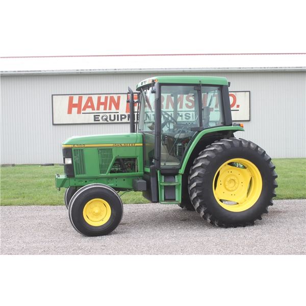 JD 6300 2wd tractor, cab, air, 16 speed power quad, 2 remotes, 18.4x34, 4565 hours