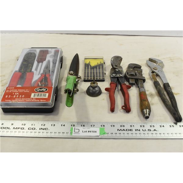 Tin snips, pipe wrench, various tools