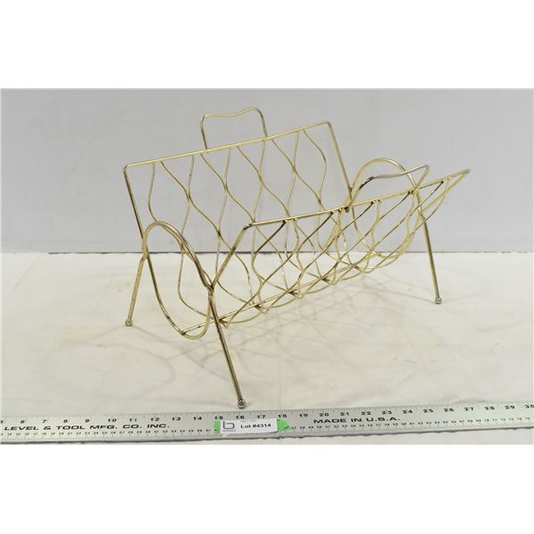 Golden wire newspaper rack