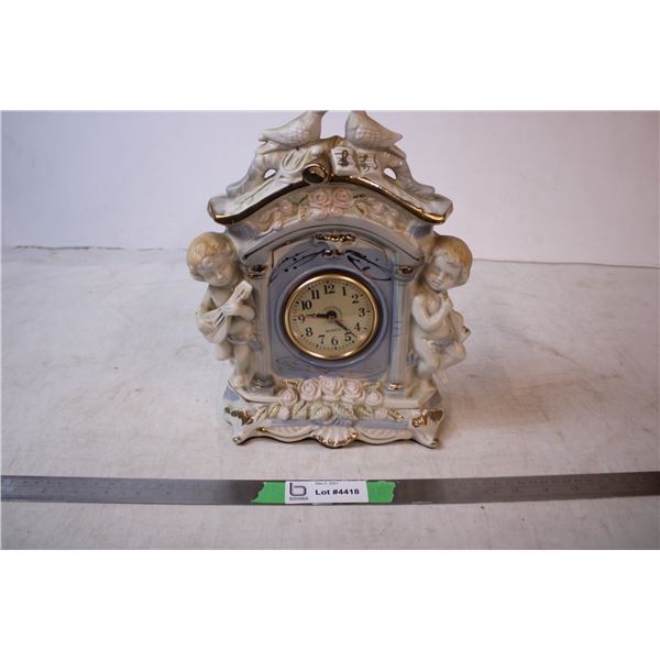 Cherub Baby Clock (scratch on front of glass)