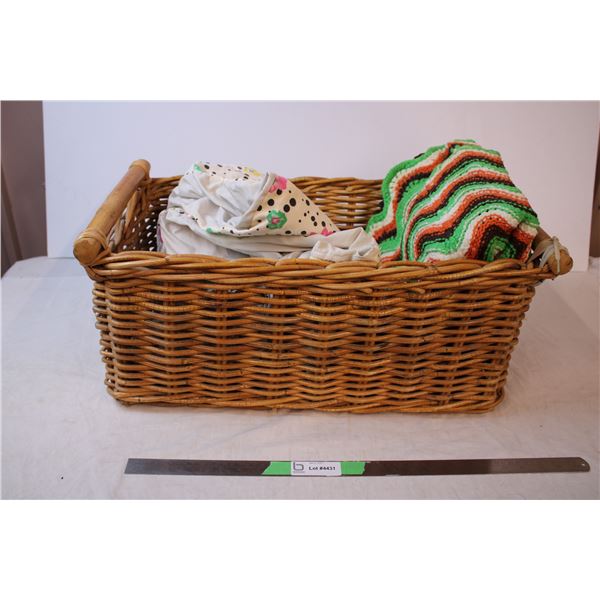 Wicker basket with throw blankets