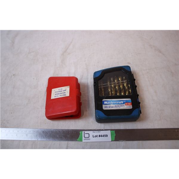 2 containers with drill bits