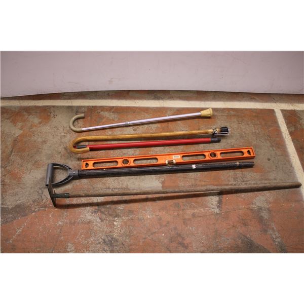 small rake, two canes, plastic level, broom handle